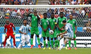 Argentina's Lionel Messi scores his second goal against Nigeria from a free-kick in Group F.