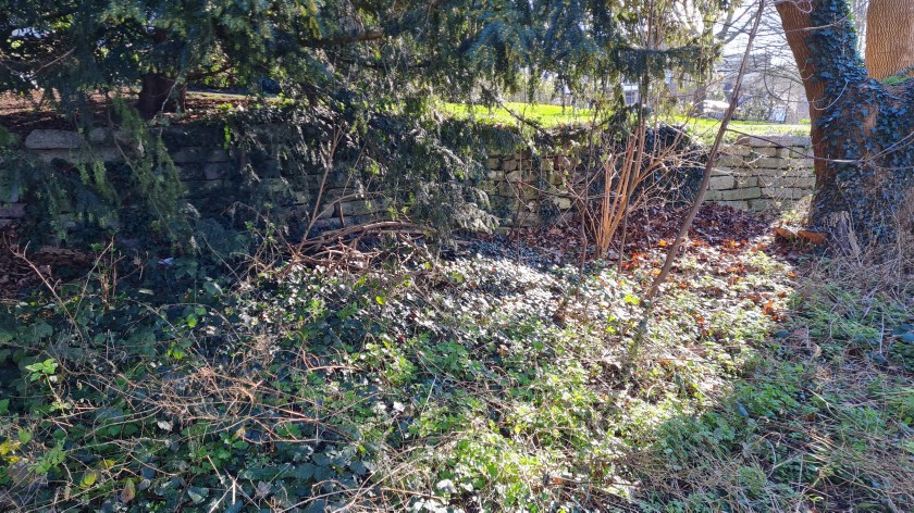 This crumbling stone wall in Brenchley Gardens can be found alongside what was the track bed - was this railway related?